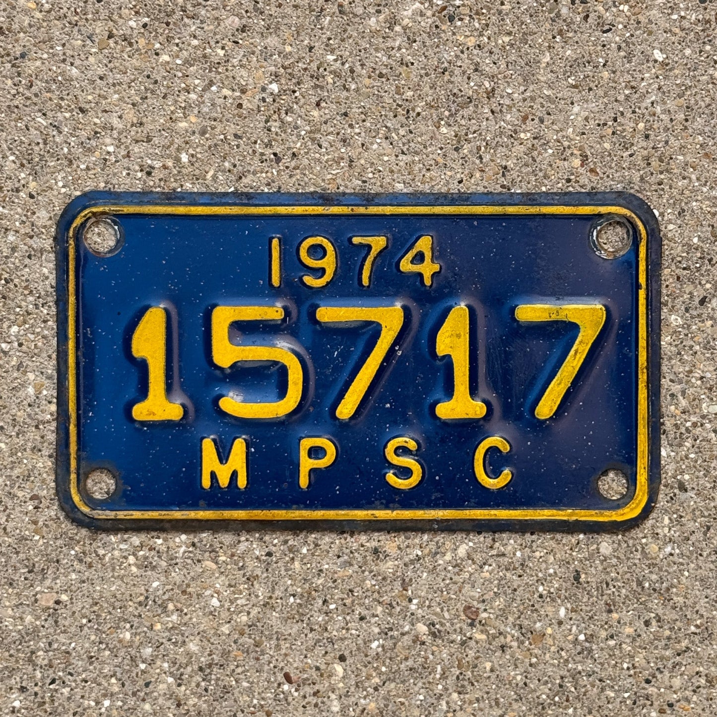 Photo of a 1974 Michigan Michigan Public Service Commission License Plate Auto Tag Garage Decor Vintage 15717