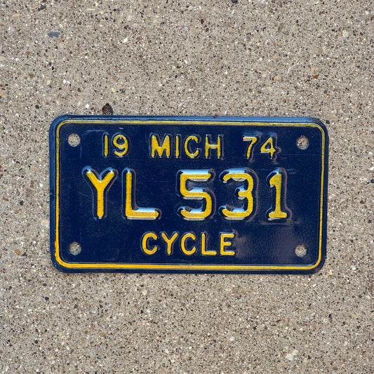 Photo of a 1974 Michigan Motorcycle License Plate Auto Tag Garage Decor Vintage YL 531