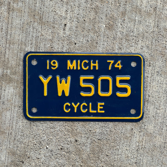 Photo of a 1974 Michigan Motorcycle License Plate Auto Tag Garage Decor Vintage YW 505 with original patina