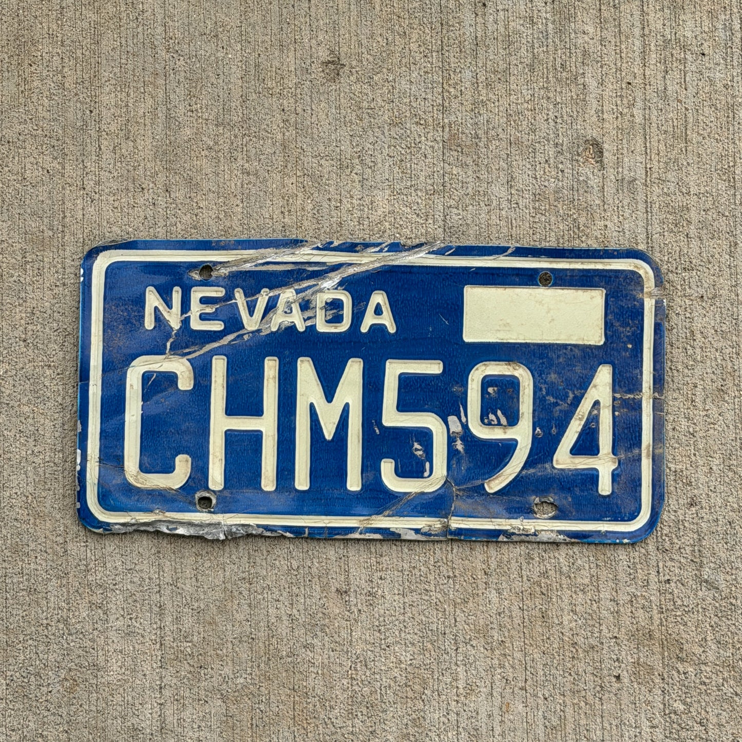 Photo of a 1974 Nevada License Plate Auto Tag 1 Vintage Garage CHM 594 with original patina