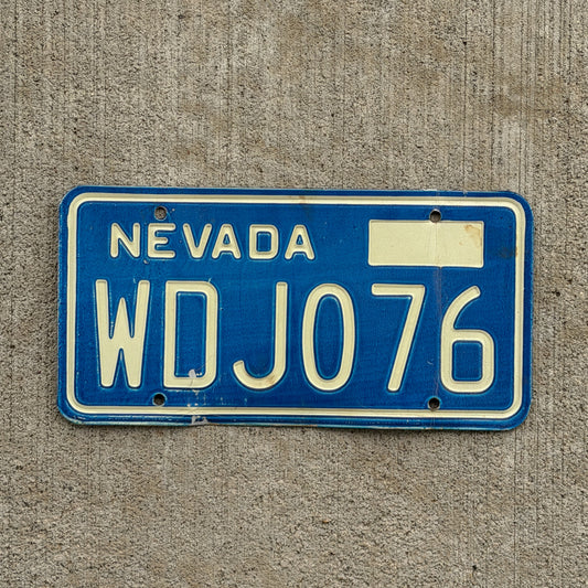Photo of a 1974 Nevada License Plate Auto Tag 1 Vintage Garage WDJ 076 with original patina
