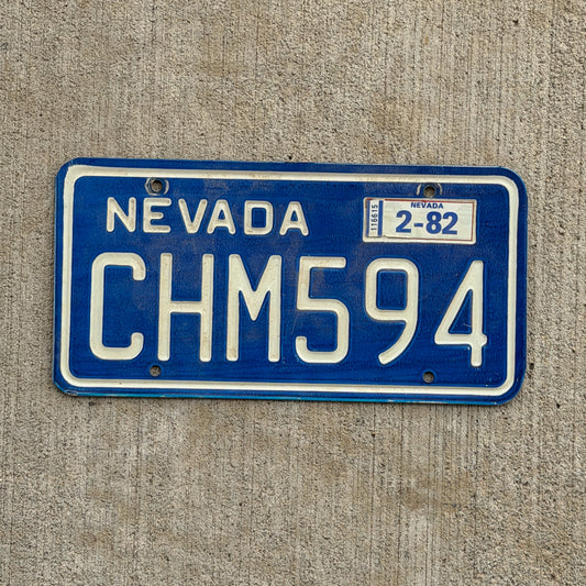 Photo of a 1974 Nevada License Plate Auto Tag 2 Vintage Garage CHM 594 with original patina