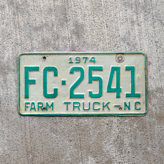 Photo of a 1974 North Carolina Farm Truck License Plate Auto Tag Garage Decor Vintage FC 2541 with original patina
