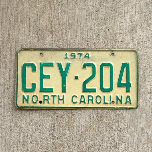 Photo of a 1974 North Carolina License Plate Auto Tag Garage Decor Vintage CEY 204 with original patina