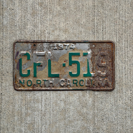 Photo of a 1974 North Carolina License Plate Auto Tag Garage Decor Vintage CFL 519 with original patina