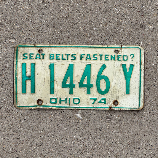 Photo of a 1974 Ohio License Plate Auto Tag 1 Vintage Garage H 1446 Y with original patina
