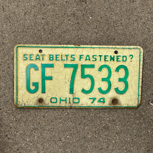 Photo of a 1974 Ohio License Plate Auto Tag 2 Vintage Garage GF 7533 with original patina