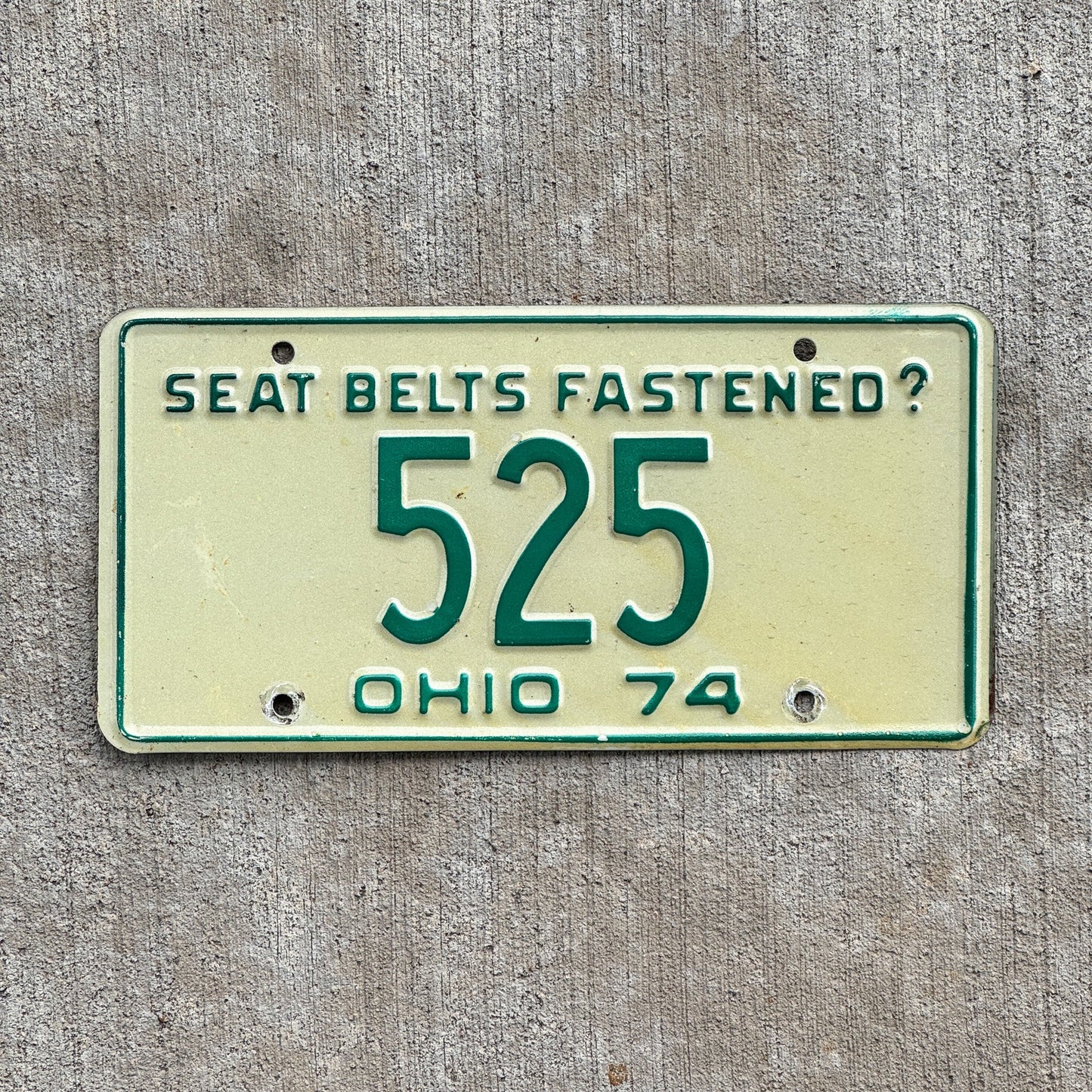 Photo of a 1974 Ohio License Plate Auto Tag 2 Vintage Garage Low Number Three Digit 525 with original patina