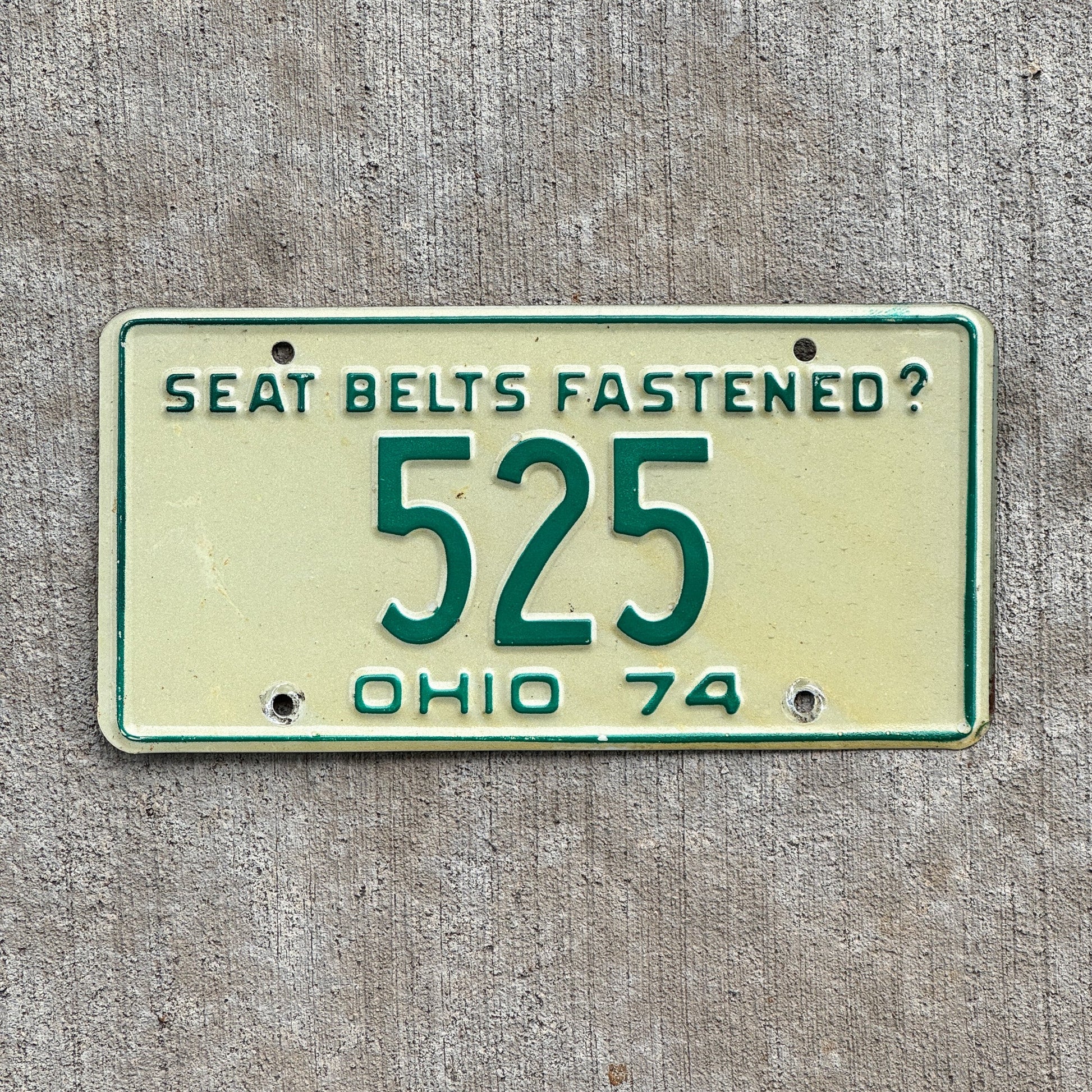Photo of a 1974 Ohio License Plate Auto Tag 2 Vintage Garage Low Number Three Digit 525 with original patina