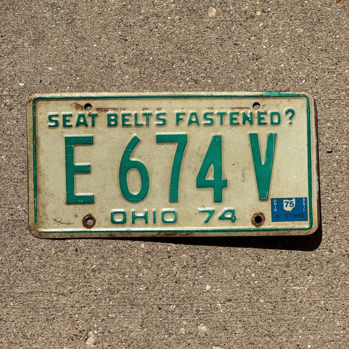 Photo of a 1974 Ohio License Plate Auto Tag Garage Decor Vintage E 674 V