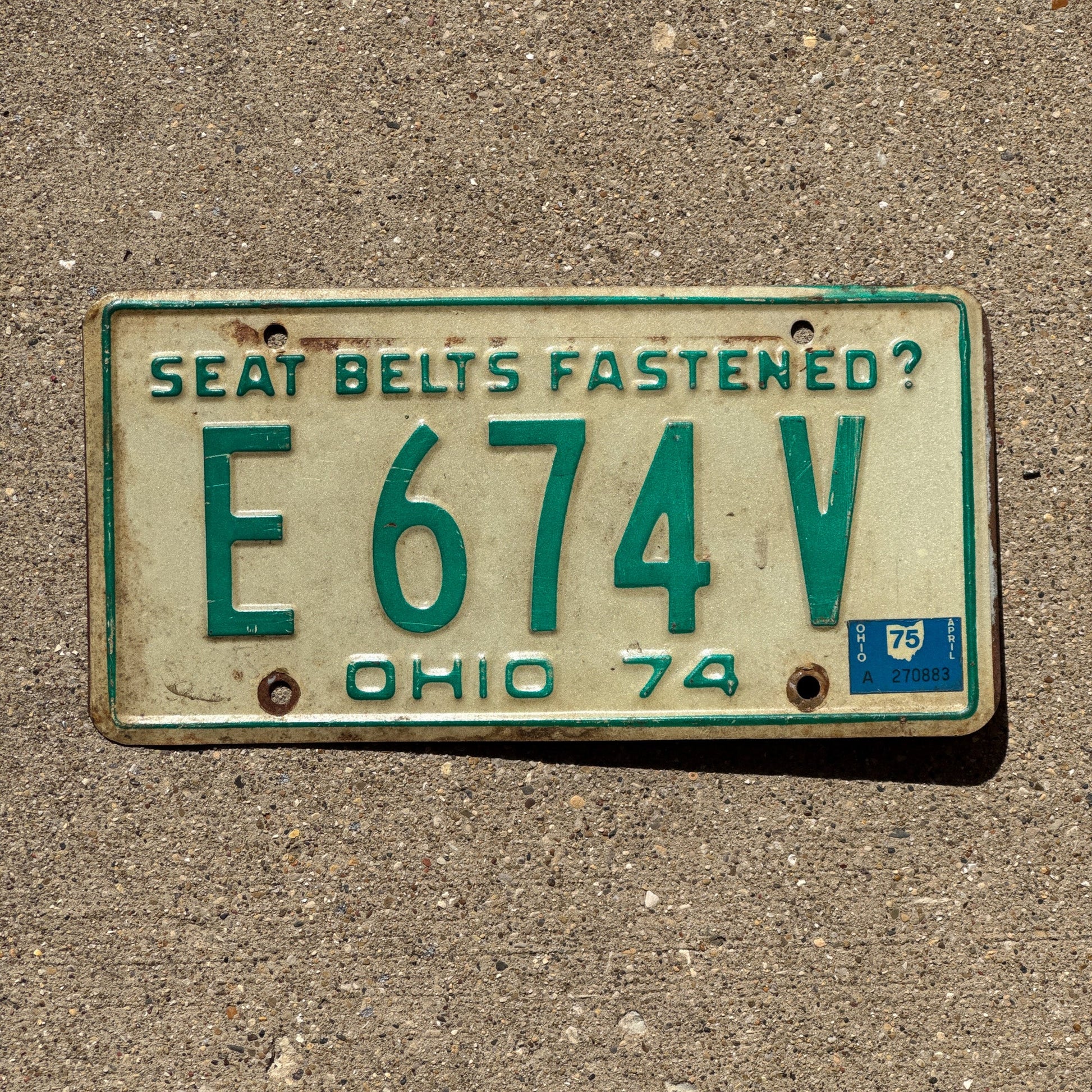 Photo of a 1974 Ohio License Plate Auto Tag Garage Decor Vintage E 674 V