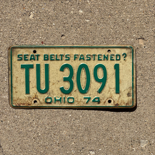 Photo of a 1974 Ohio License Plate Auto Tag Garage Decor Vintage TU 3091