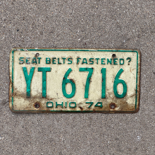 Photo of a 1974 Ohio License Plate Auto Tag Garage Decor Vintage YT 6716 with original patina