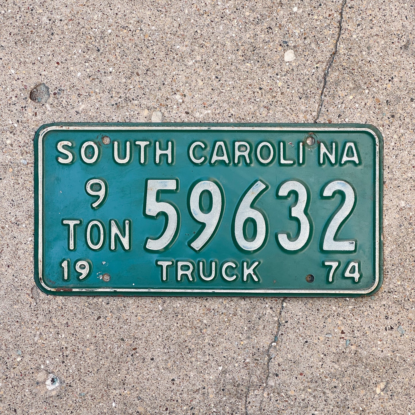Photo of a 1974 South Carolina Truck License Plate Auto Tag Garage Decor Vintage 9 Ton 59632 with original patina