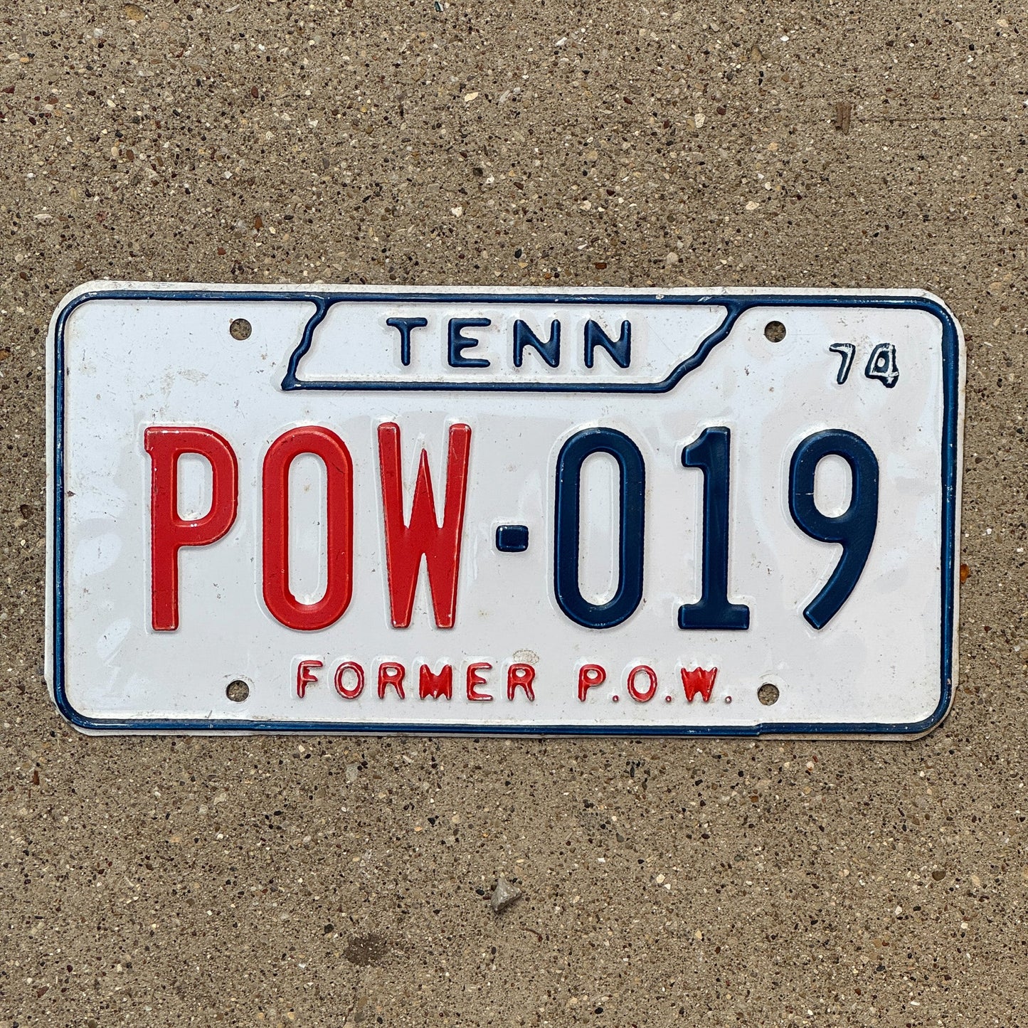 Photo of a 1974 Tennessee Prisoner of War License Plate Auto Tag Garage Decor Vintage POW 019