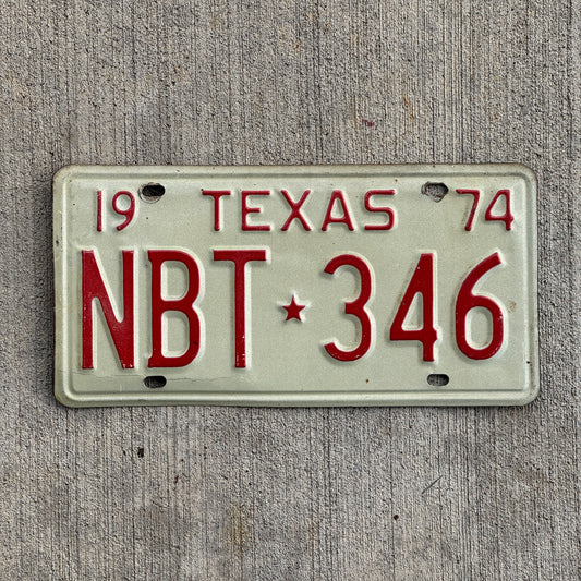 Photo of a 1974 Texas License Plate Auto Tag Garage Decor Vintage NBT 346 with original patina