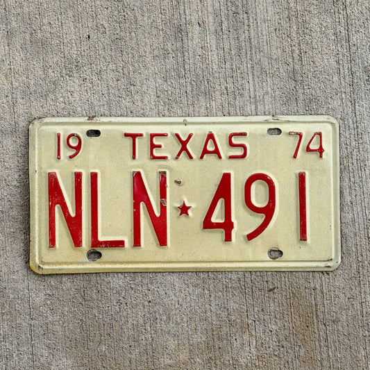 Photo of a 1974 Texas License Plate Auto Tag Garage Decor Vintage NLN 491 with original patina