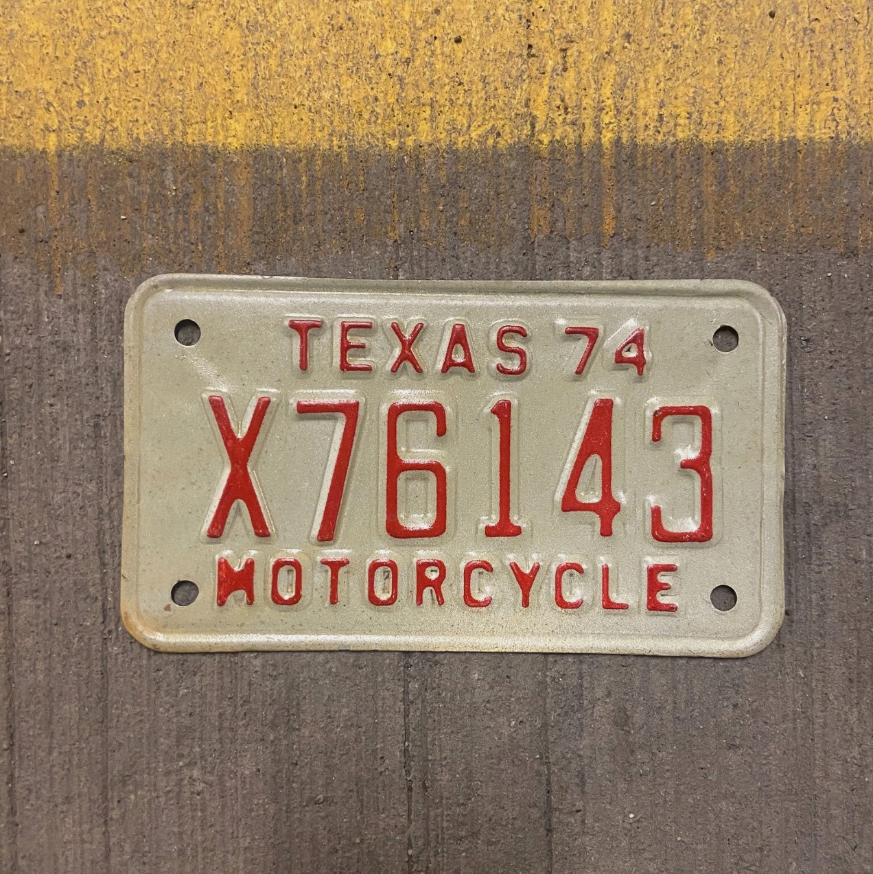 Photo of a 1974 Texas Motorcycle License Plate Auto Tag Garage Decor Vintage X 76143 with original patina