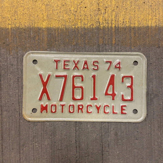Photo of a 1974 Texas Motorcycle License Plate Auto Tag Garage Decor Vintage X 76143 with original patina