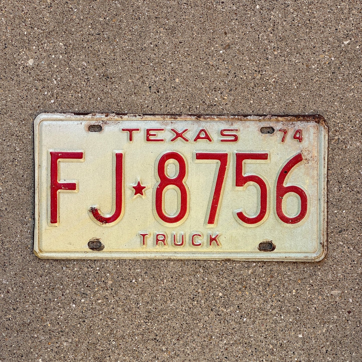 Photo of a 1974 Texas Truck License Plate Auto Tag Garage Decor Vintage FJ 8756
