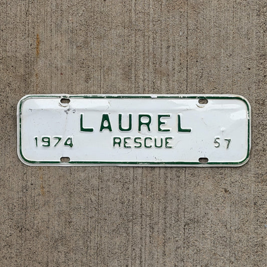 Photo of a 1974 Virginia Tax Strip License Plate Auto Tag Garage Decor Vintage Laurel Rescue 57 with original patina