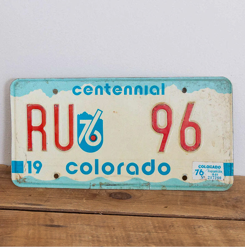 Photo of a 1975 1976 Colorado License Plate Auto Tag Garage Decor Vintage RU 96 with original patina