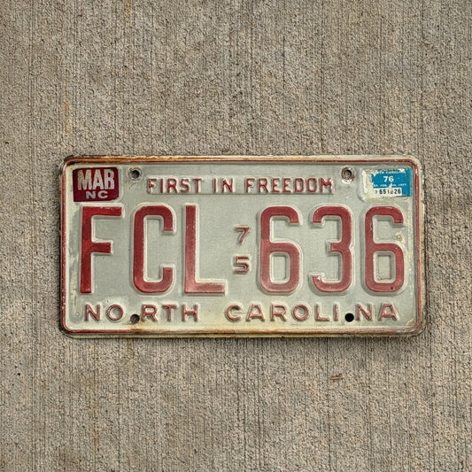 Photo of a 1975 1976 North Carolina License Plate Auto Tag Garage Decor Vintage FCL 636 with original patina