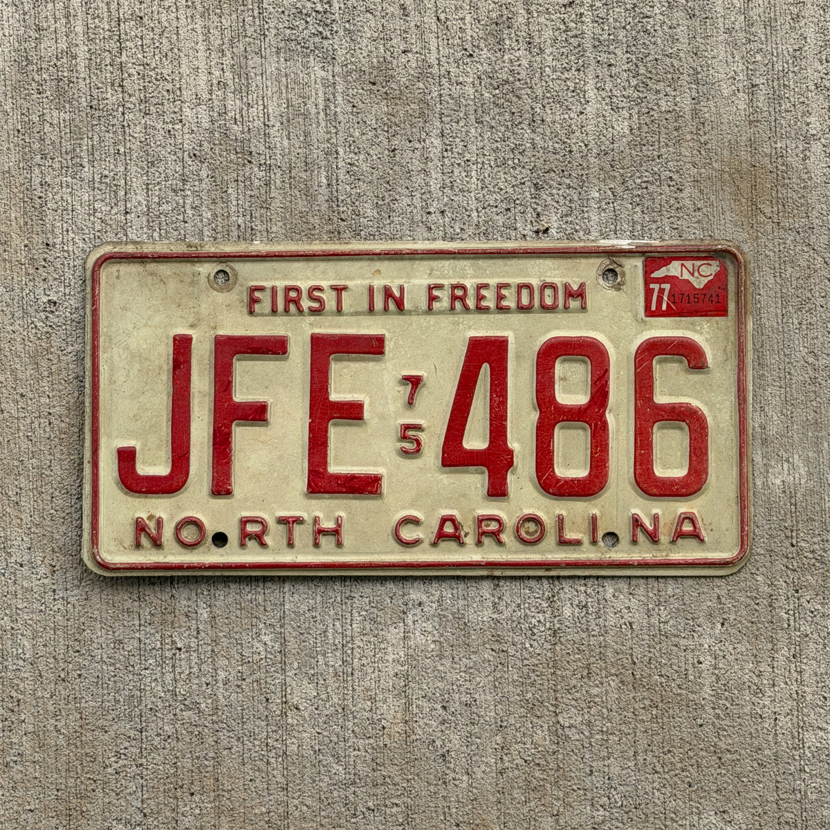 Photo of a 1975 1977 North Carolina License Plate Auto Tag Garage Decor Vintage JFE 486 with original patina