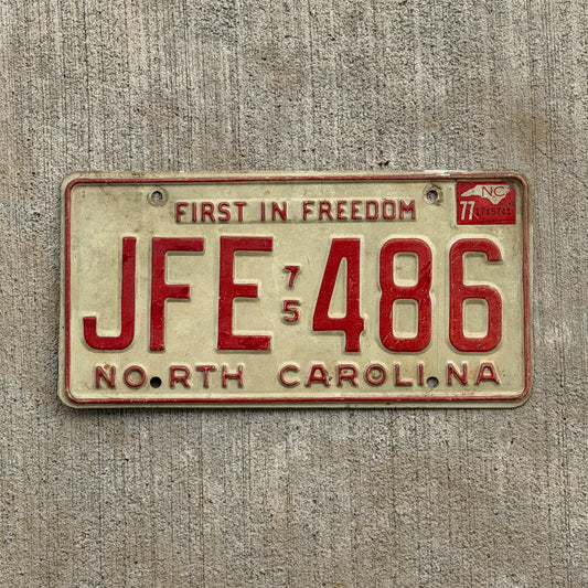Photo of a 1975 1977 North Carolina License Plate Auto Tag Garage Decor Vintage JFE 486 with original patina