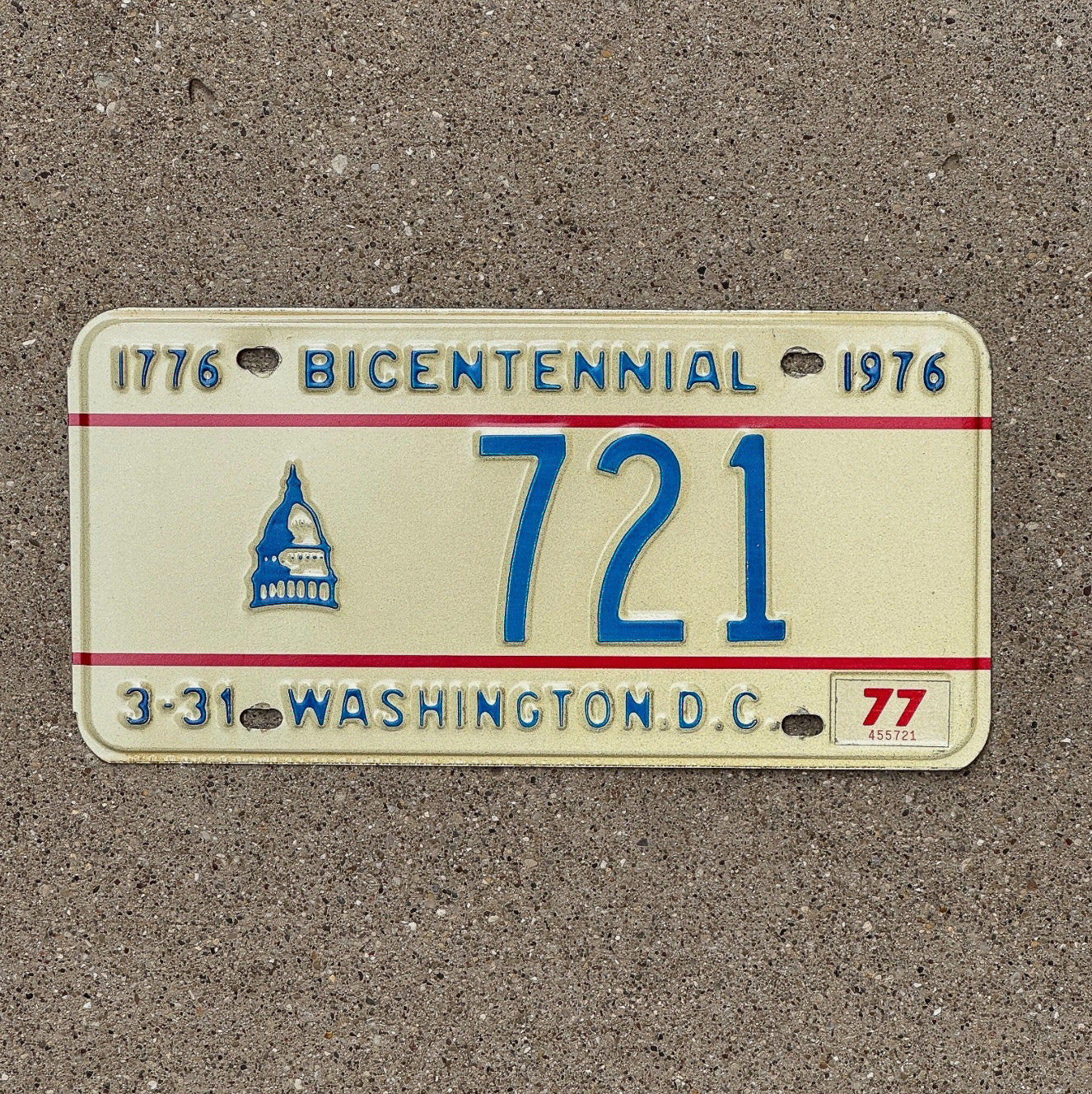 Photo of a 1975 1977 Washington DC License Plate Auto Tag 1 Garage Decor Low Number Three Digit Bicentennial 721 with original patina