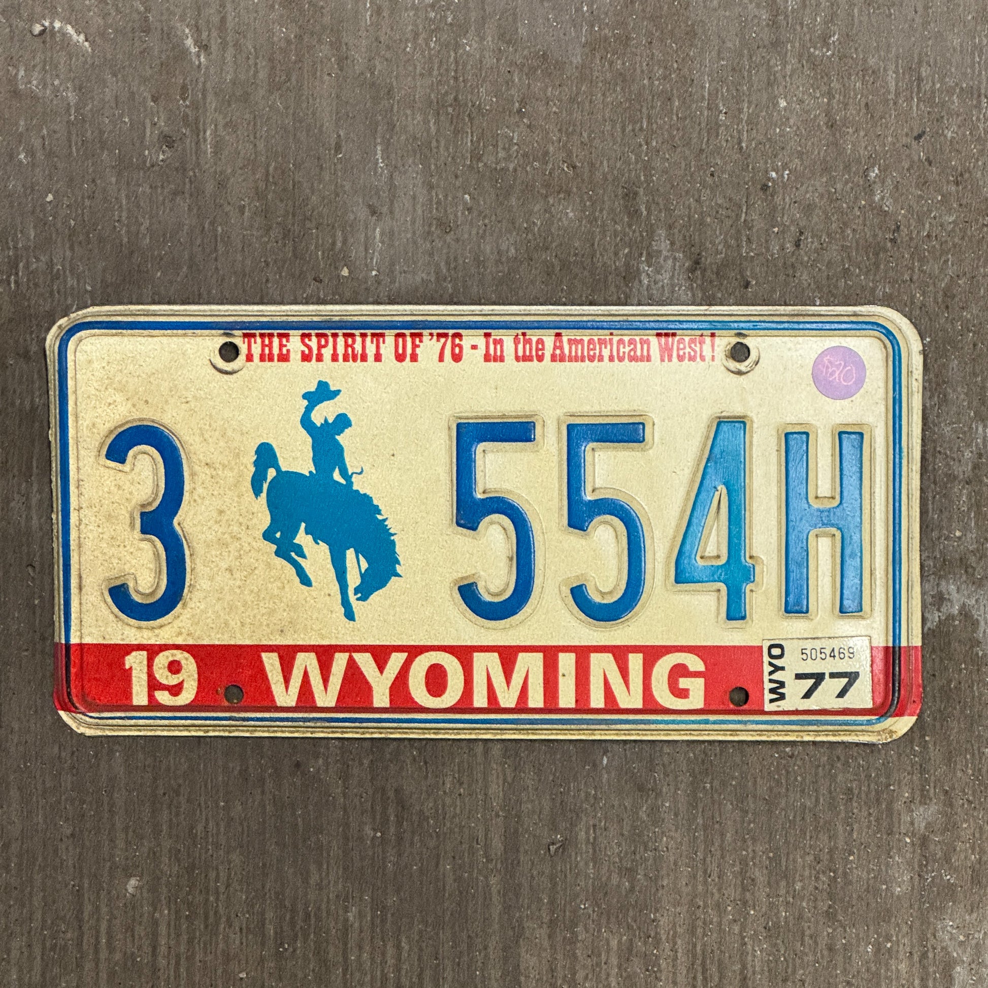 Photo of a 1975 1977 Wyoming License Plate Auto Tag Garage Decor Vintage 3 554 H with original patina