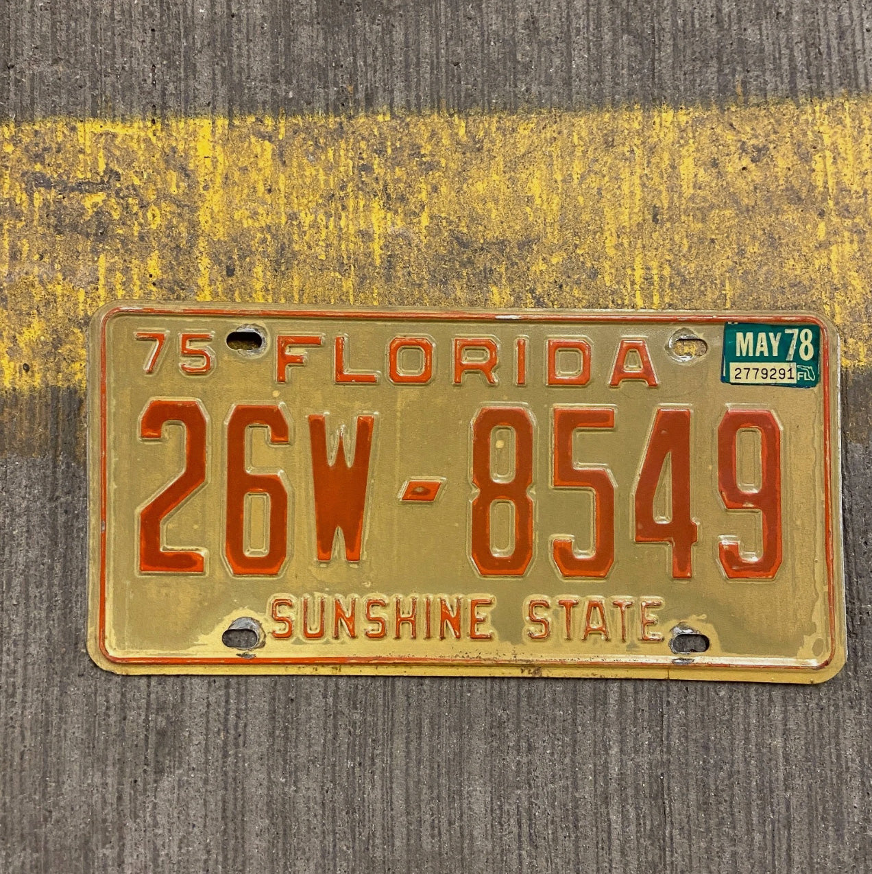 Photo of a 1975 1978 Florida License Plate Auto Tag Garage Decor Vintage 26 W 8549 with original patina