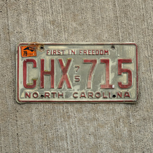 Photo of a 1975 1979 North Carolina License Plate Auto Tag Garage Decor Vintage CHX 715 with original patina