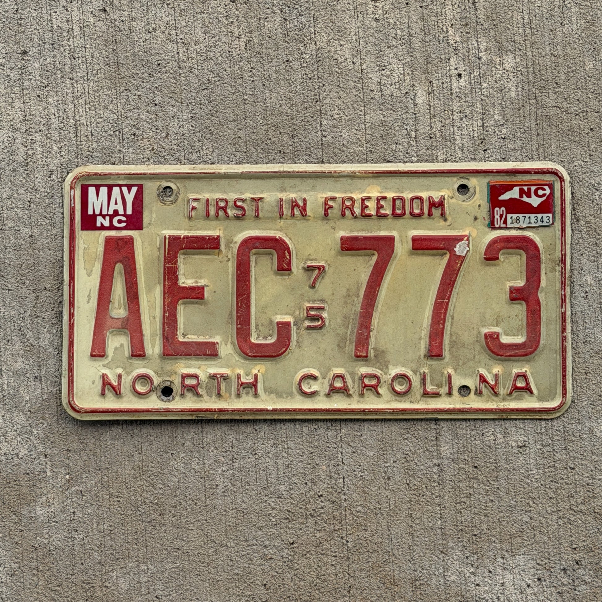 Photo of a 1975 1982 North Carolina License Plate Auto Tag Garage Decor Vintage AEC 773 with original patina