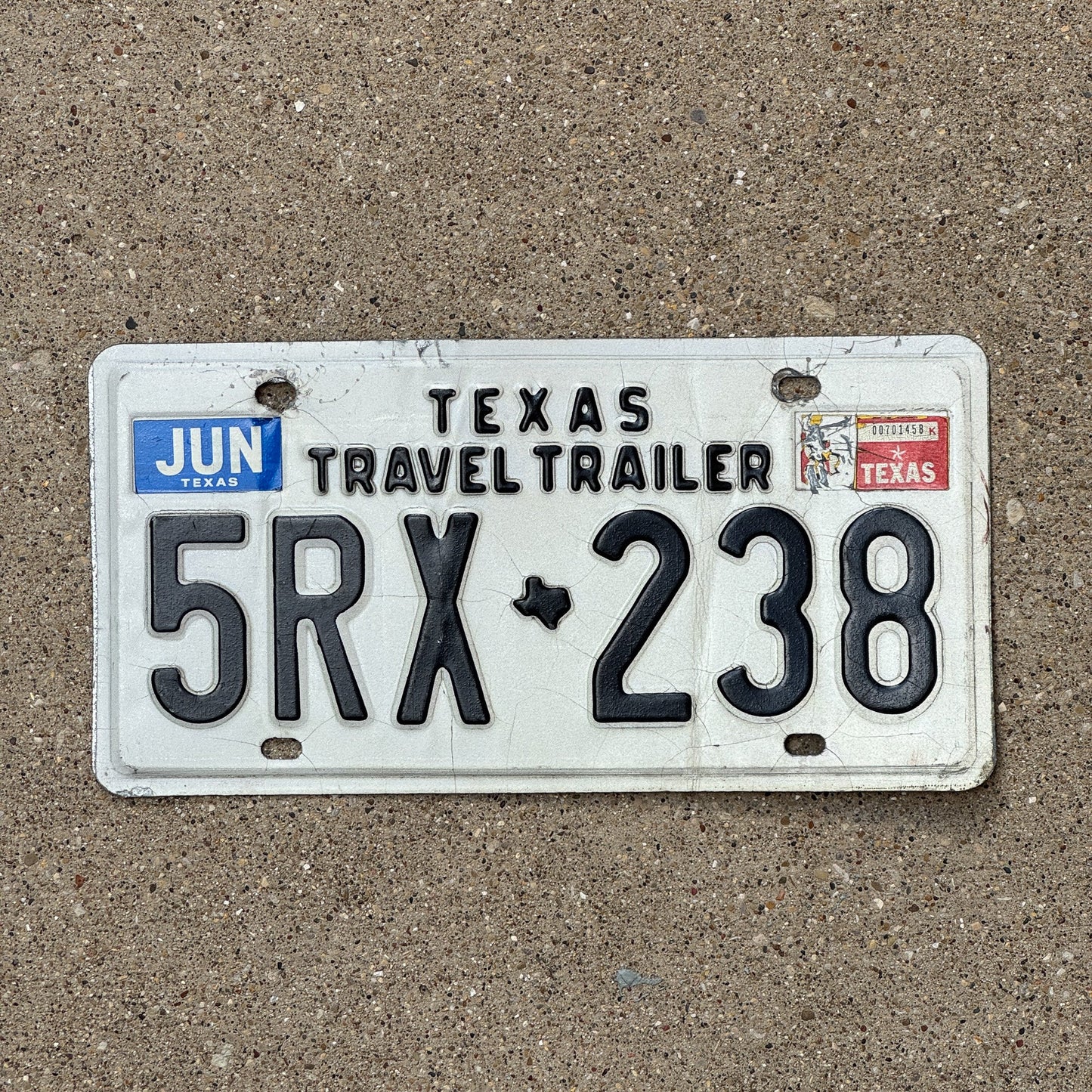 Photo of a 1975 1986 Texas Travel Trailer License Plate Auto Tag Garage Decor Vintage 5RX 238