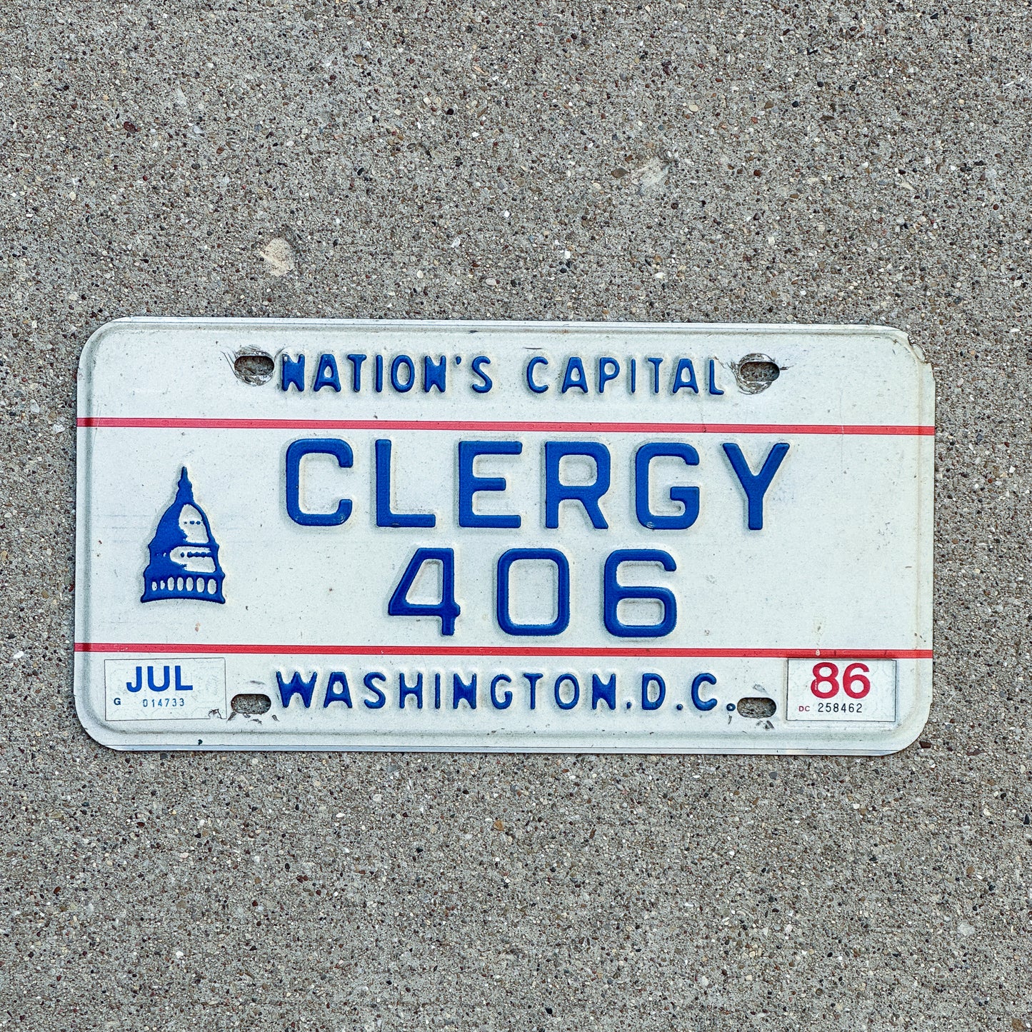 Photo of a 1975 1986 Washington DC Clergy License Plate Auto Tag Garage Decor Vintage Hard to Find Type 406 with original patina