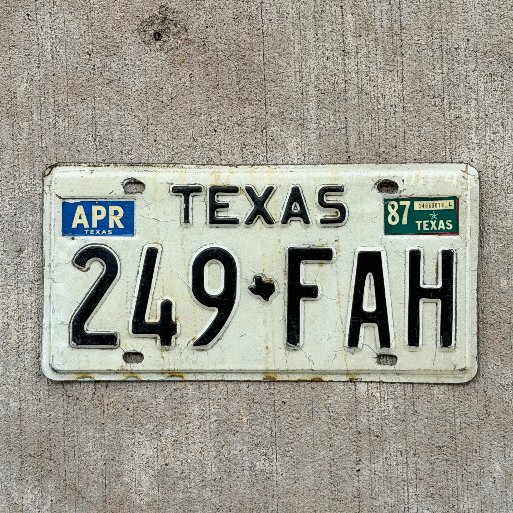 Photo of a 1975 1987 Texas License Plate Auto Tag Garage Decor Vintage 249 FAH with original patina