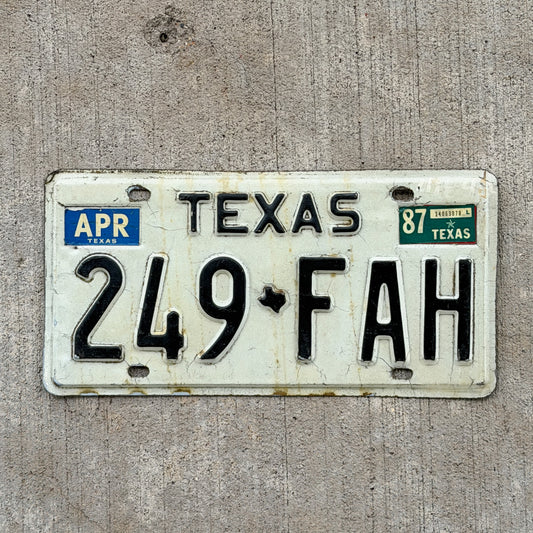 Photo of a 1975 1987 Texas License Plate Auto Tag Garage Decor Vintage 249 FAH with original patina