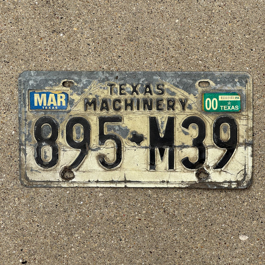 Photo of a 1975 2000 Texas Machinery License Plate Auto Tag Garage Decor Vintage 895 M39