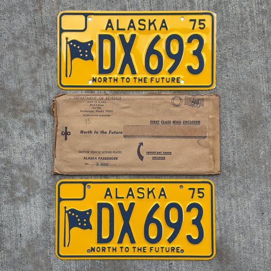 Photo of a 1975 Alaska License Plate Pair Auto Tag Garage Decor Vintage With Envelope High Quality DX 693 with original patina