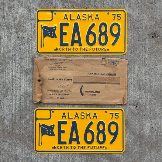 Photo of a 1975 Alaska License Plate Pair Auto Tag Garage Decor Vintage With Envelope High Quality EA 689 with original patina