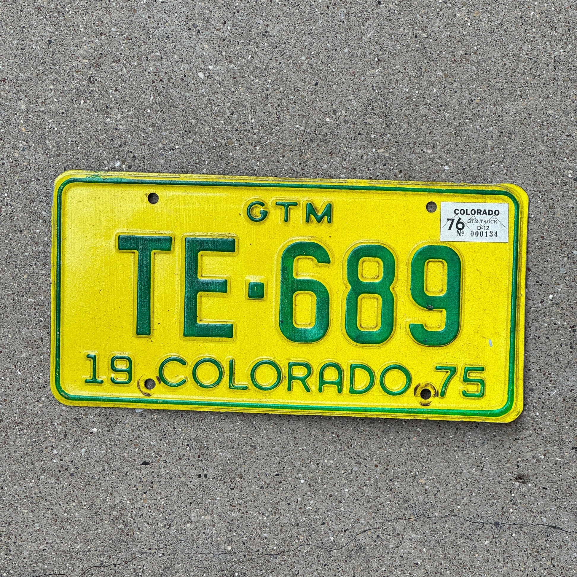 Photo of a 1975 Colorado GTM License Plate Auto Tag Garage Decor Vintage TE 689