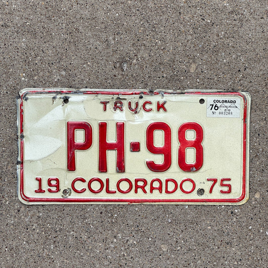 Photo of a 1975 Colorado TRUCK License Plate Auto Tag Garage Decor Vintage PH 98