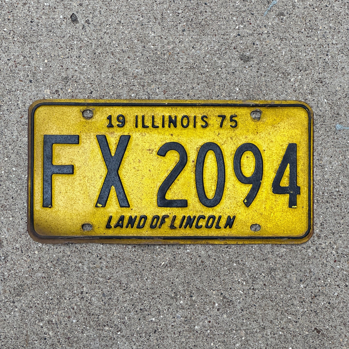 Photo of a 1975 Illinois License Plate Auto Tag 1 Vintage Garage FX 2094 with original patina