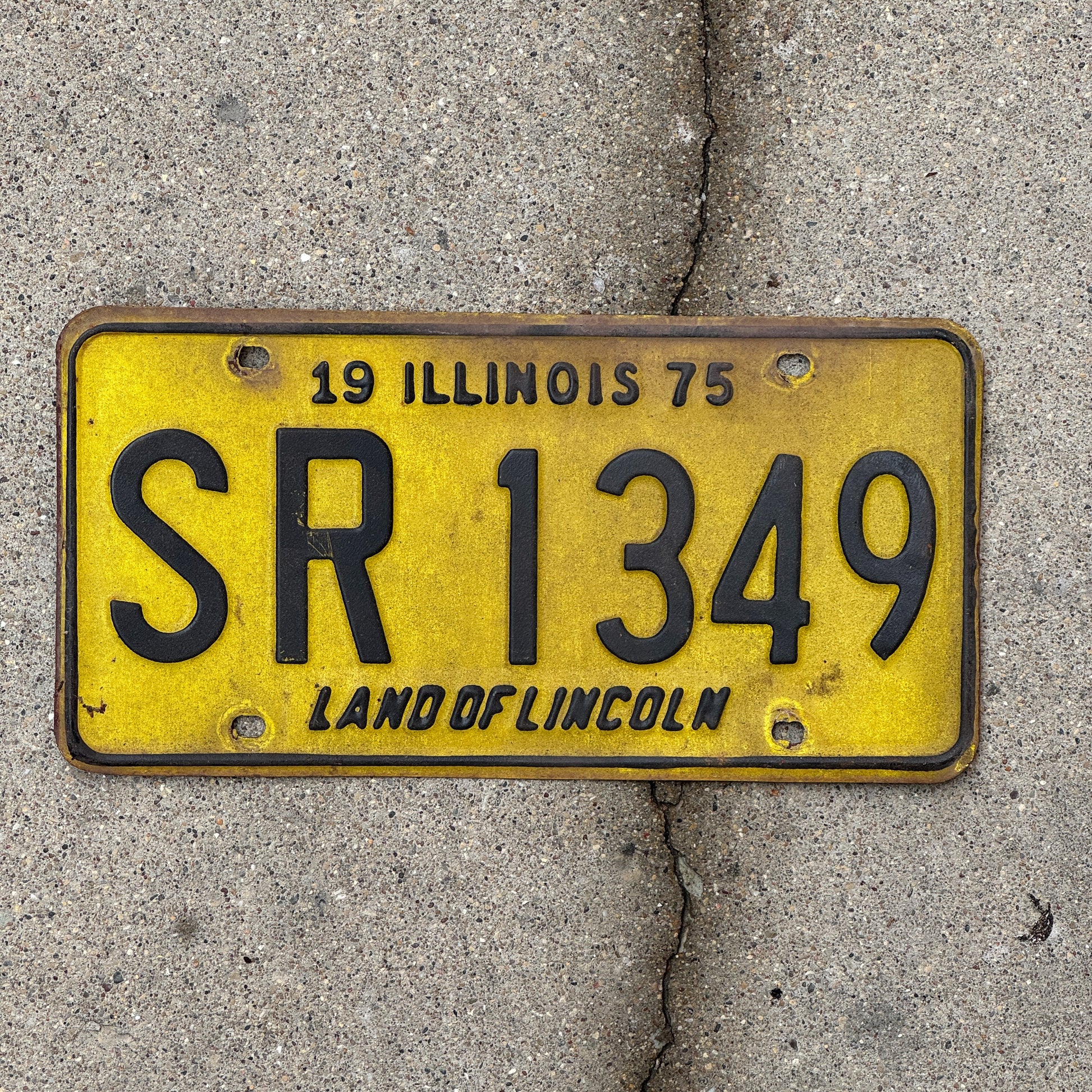 Photo of a 1975 Illinois License Plate Auto Tag 1 Vintage Garage SR 1349 with original patina