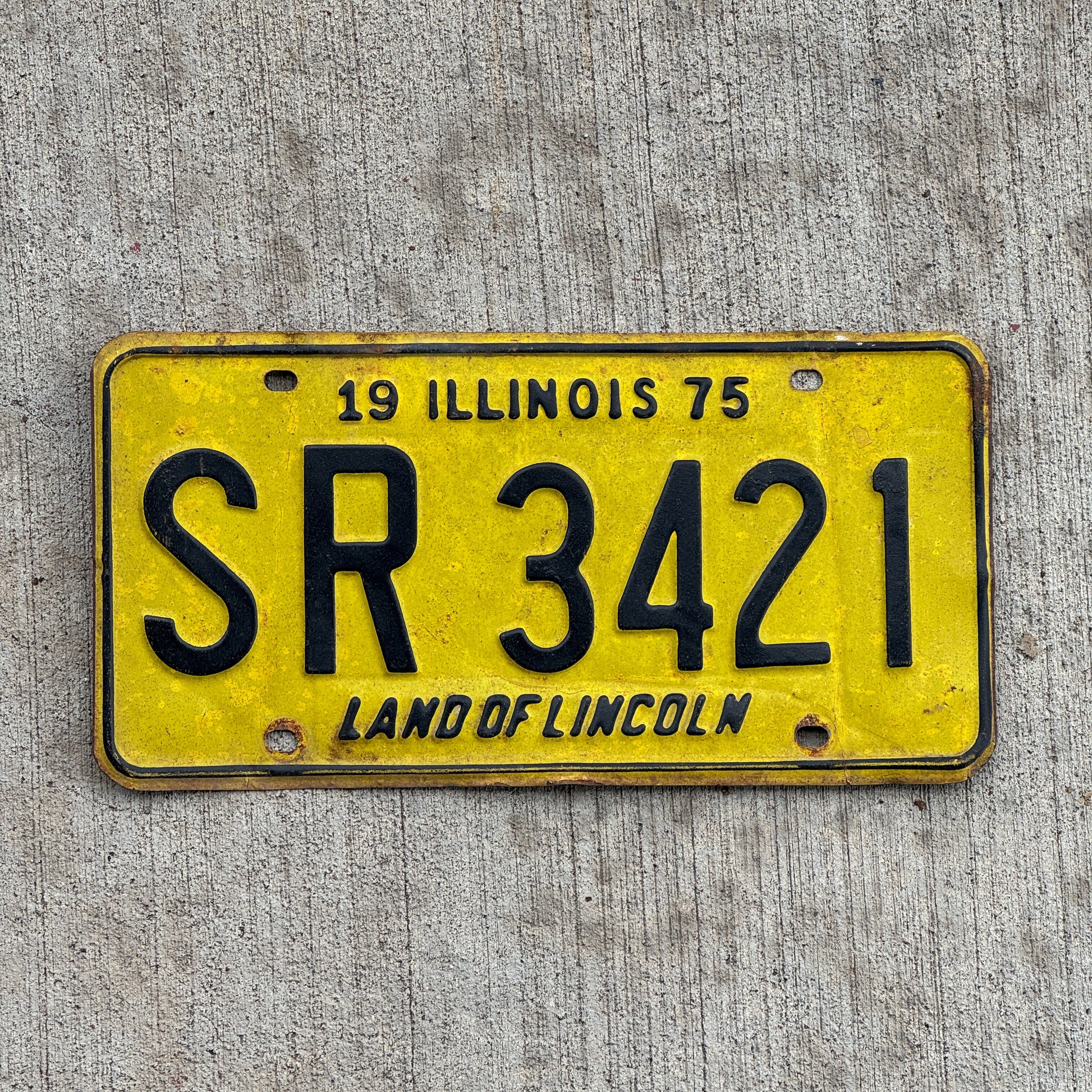 Photo of a 1975 Illinois License Plate Auto Tag 1 Vintage Garage SR 3421 with original patina