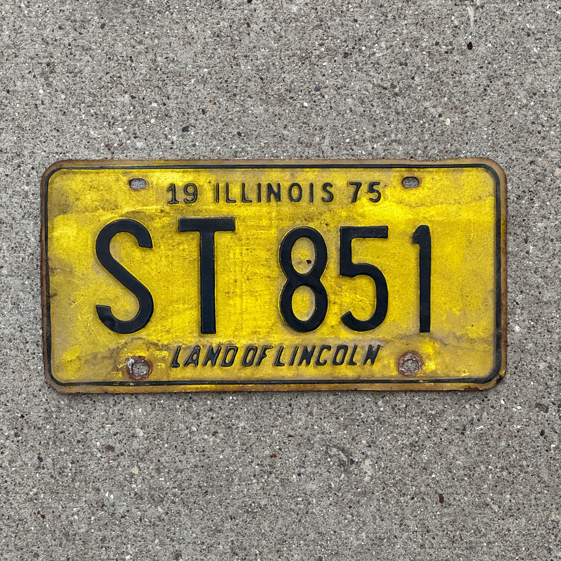 Photo of a 1975 Illinois License Plate Auto Tag 1 Vintage Garage ST 851 with original patina