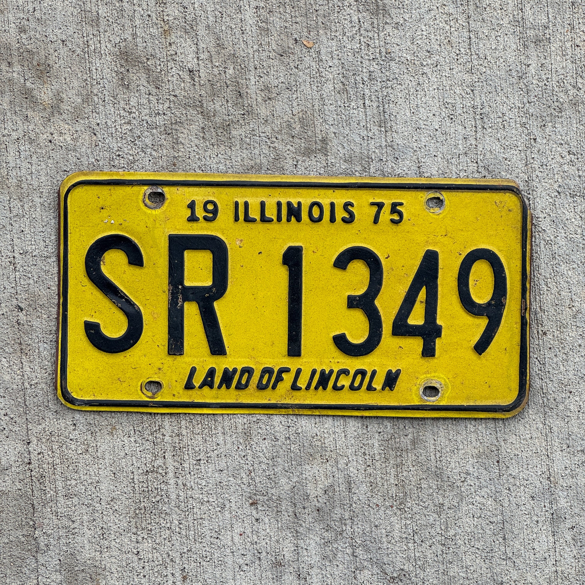 Photo of a 1975 Illinois License Plate Auto Tag 2 Vintage Garage SR 1349 with original patina