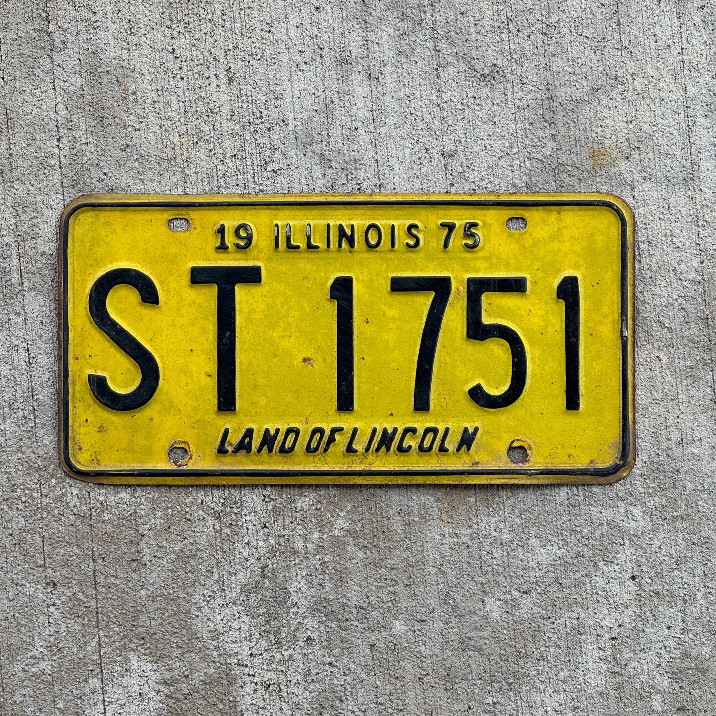 Photo of a 1975 Illinois License Plate Auto Tag 2 Vintage Garage ST 1751 with original patina