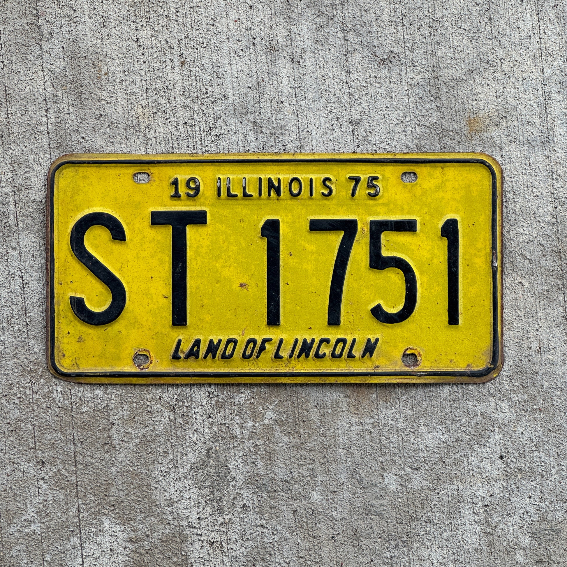 Photo of a 1975 Illinois License Plate Auto Tag 2 Vintage Garage ST 1751 with original patina